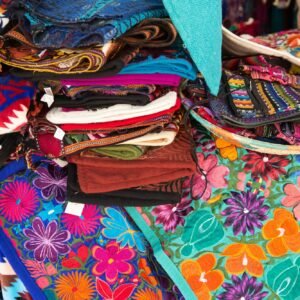 Colorful hand embroidered pillow covers at a market in Santa Fe, NM